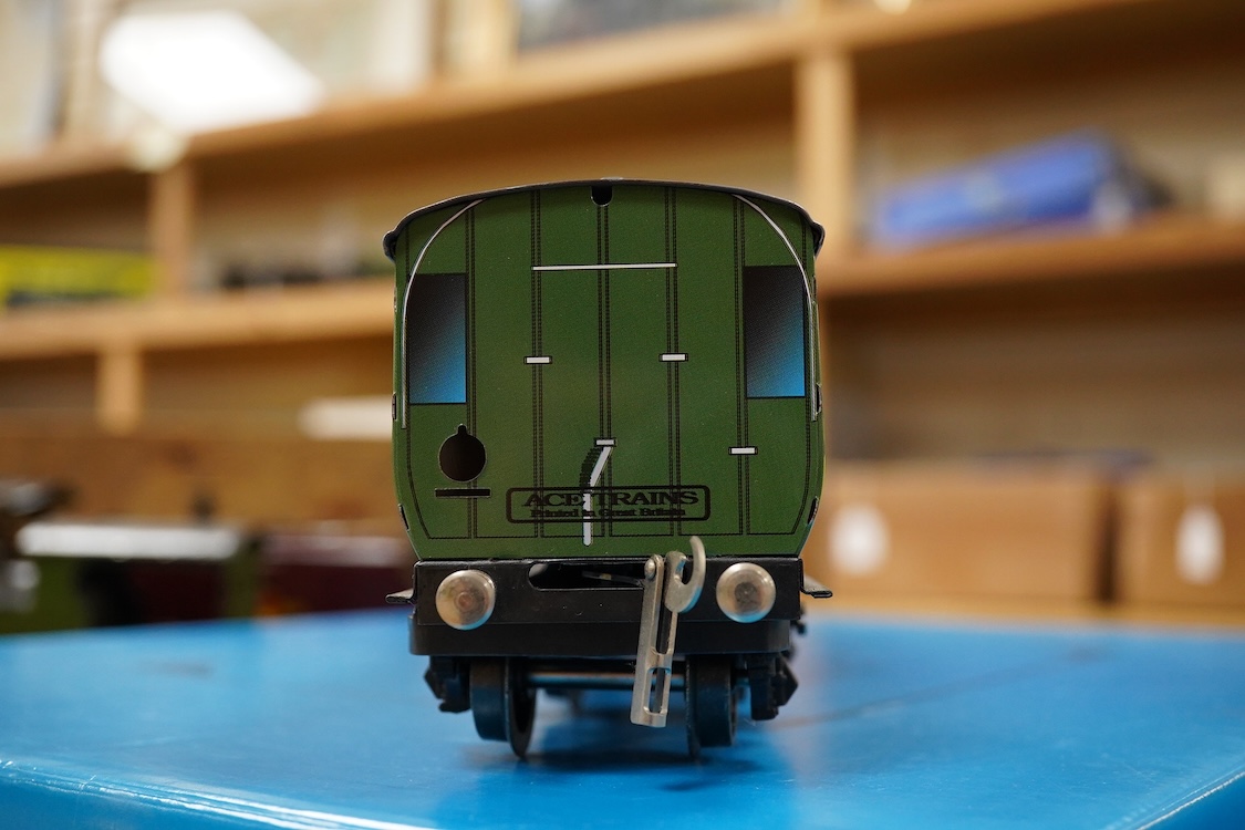 A boxed ACE Trains 0 gauge tinplate coach set; C/1 SR, comprising of three Southern Railway bogie coaches; a Full First, a Full Third and a Brake Third